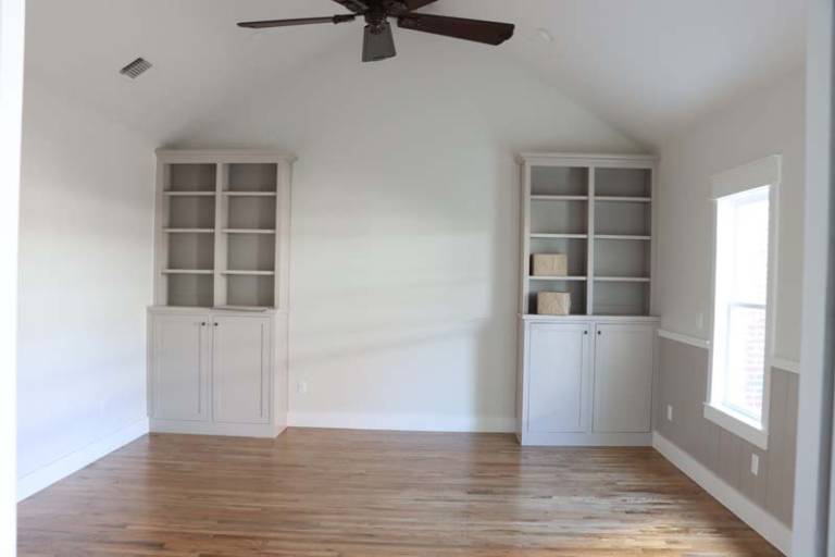 Empty room with wood flooring